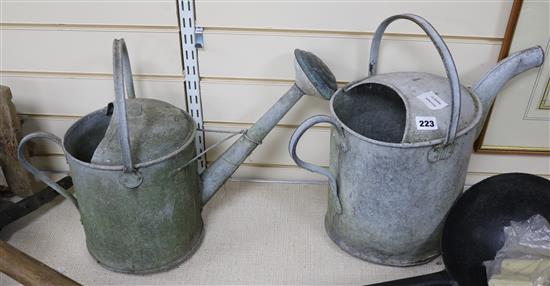 Two Edwardian galvanised tin watering cans